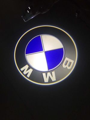 Proiettore di luce di benvenuto per porta di automobile LED per interni senza fili 6000K 12V per BMW