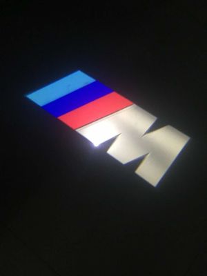 Proiettore di luce di benvenuto per porta di automobile LED per interni senza fili 6000K 12V per BMW