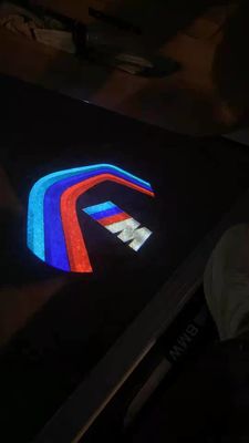 Proiettore di luce di benvenuto per porta di automobile LED per interni senza fili 6000K 12V per BMW